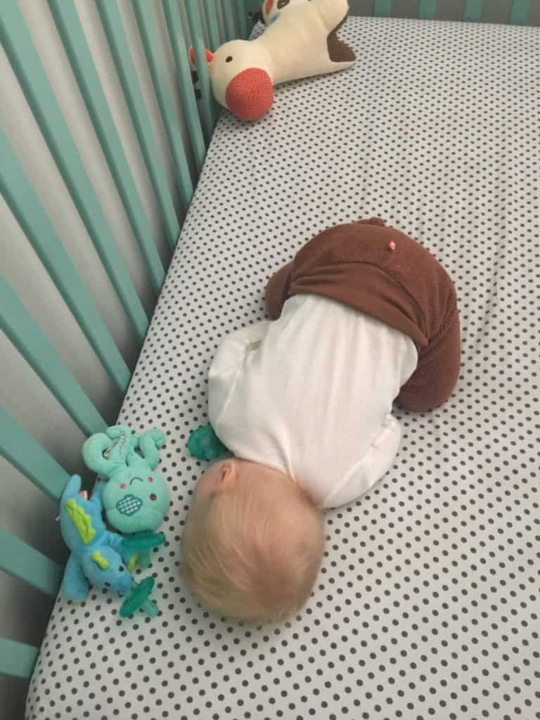 baby sleeping in a crib