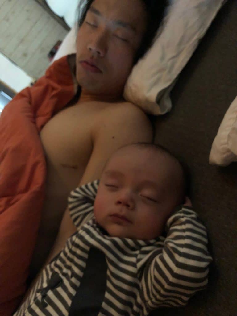 Safer sleep is on a flat surface with no blankets or pillows near baby.