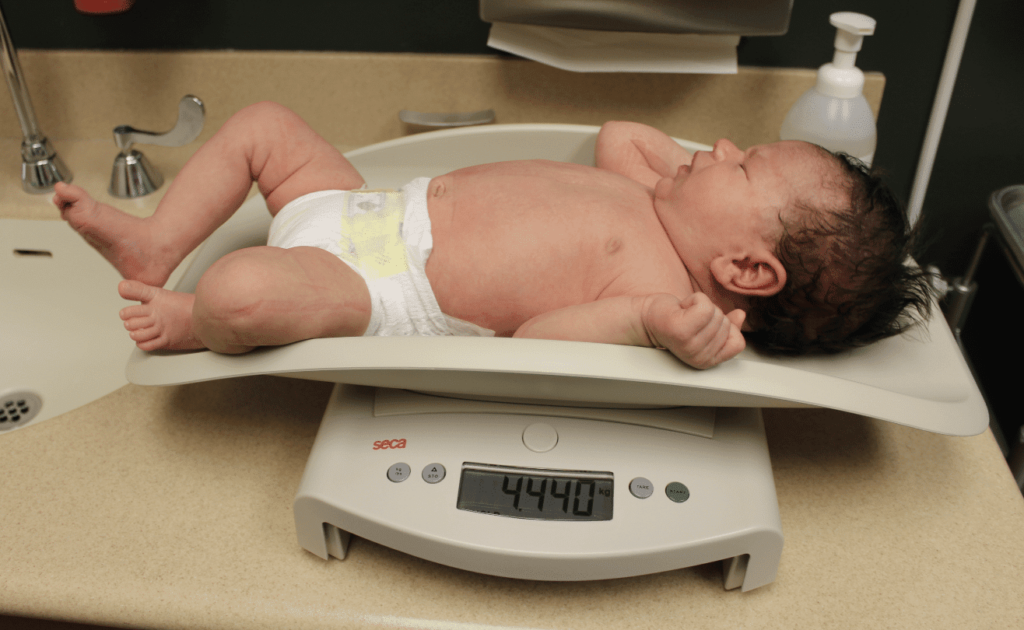Baby on scale in doctor's office