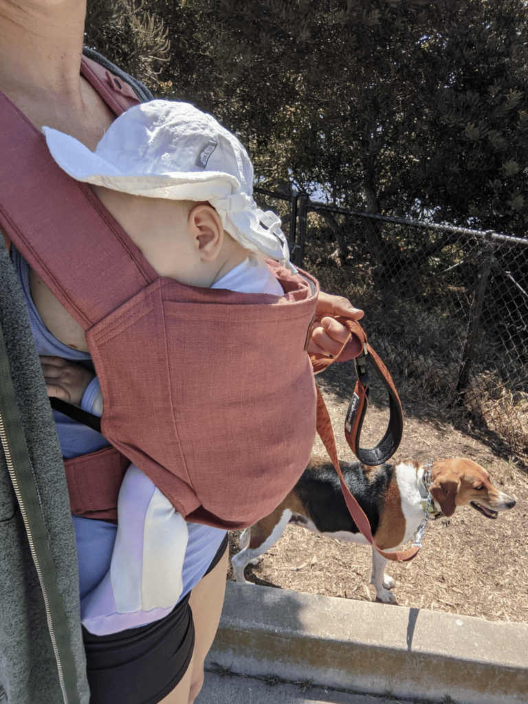 Baby breastfeeding while on a walk