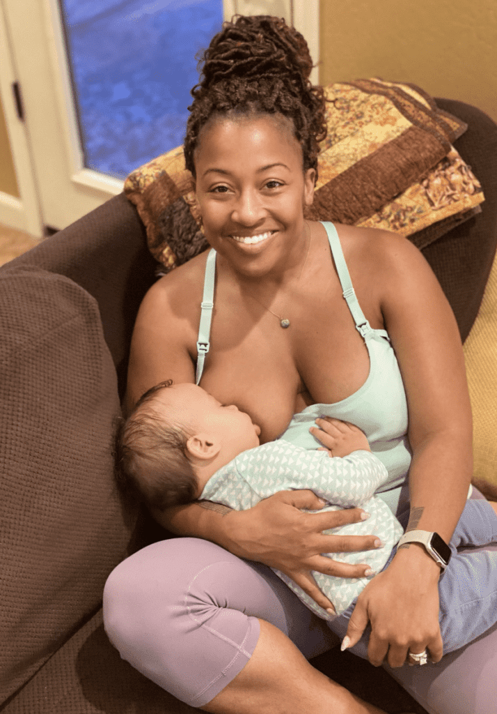 Mom breastfeeding her baby on the couch