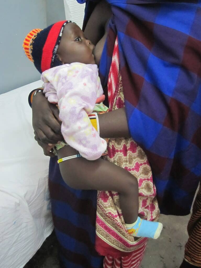 Masai woman breastfeedin