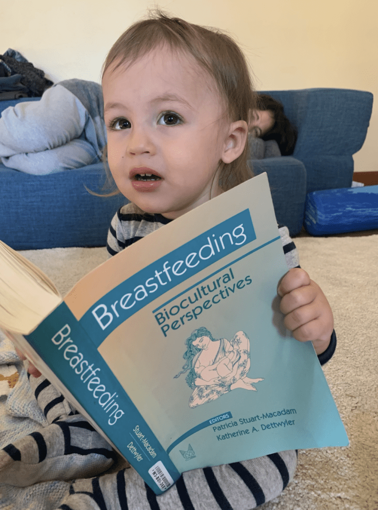 Child reading Breastfeeding Biocultural Perspectives book